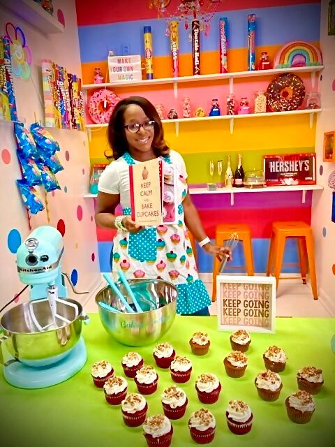 Tina in a colorful bakery kitchen